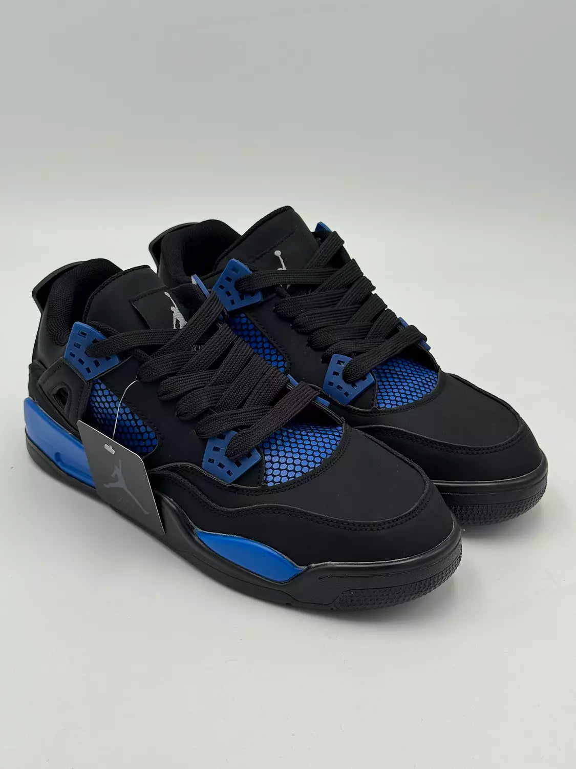 Nike Air Jordan 4 Retro "Black & Blue Thunder"