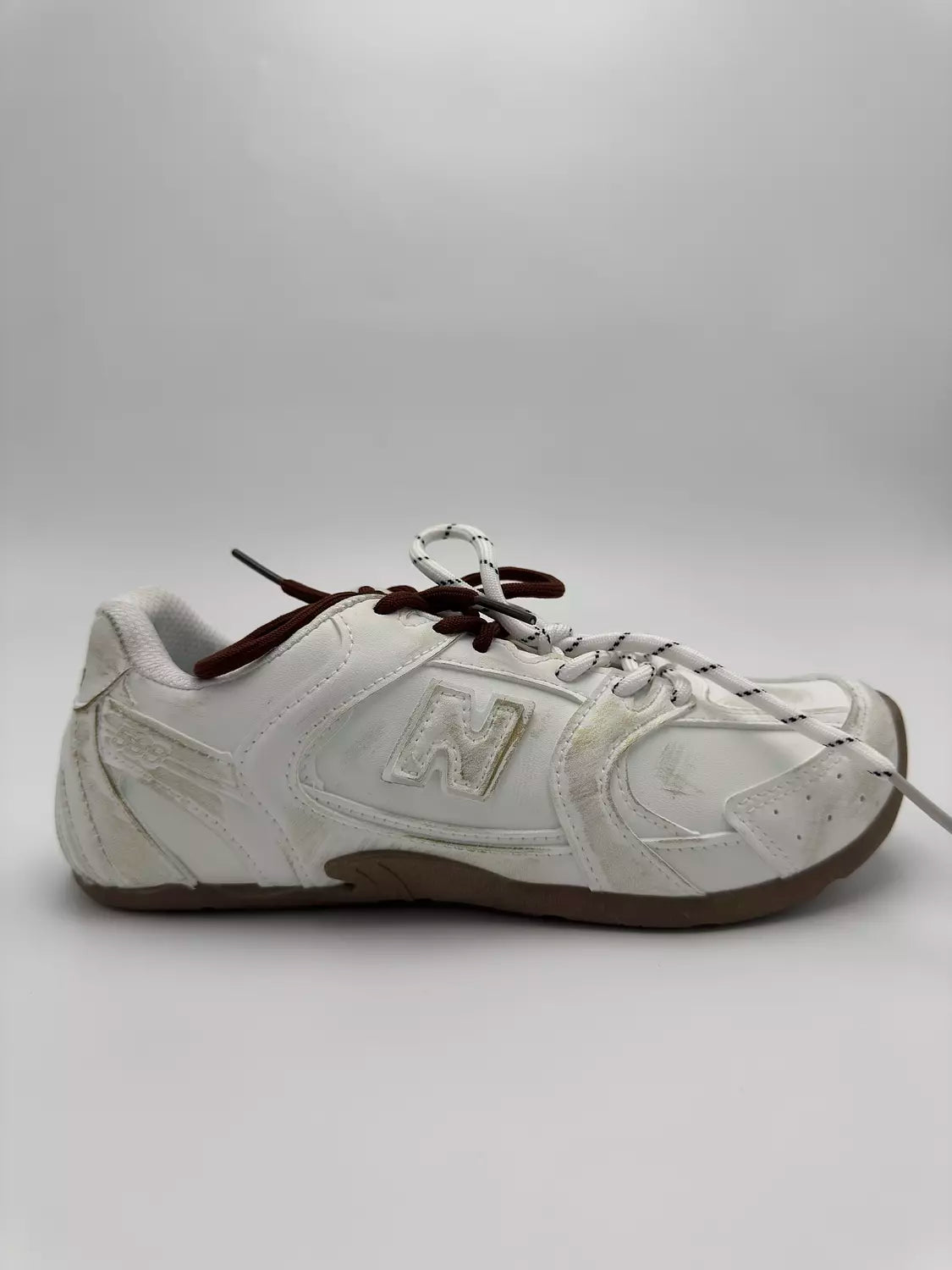 New Balance 530 SL Miu Miu "White X Gold Gum"