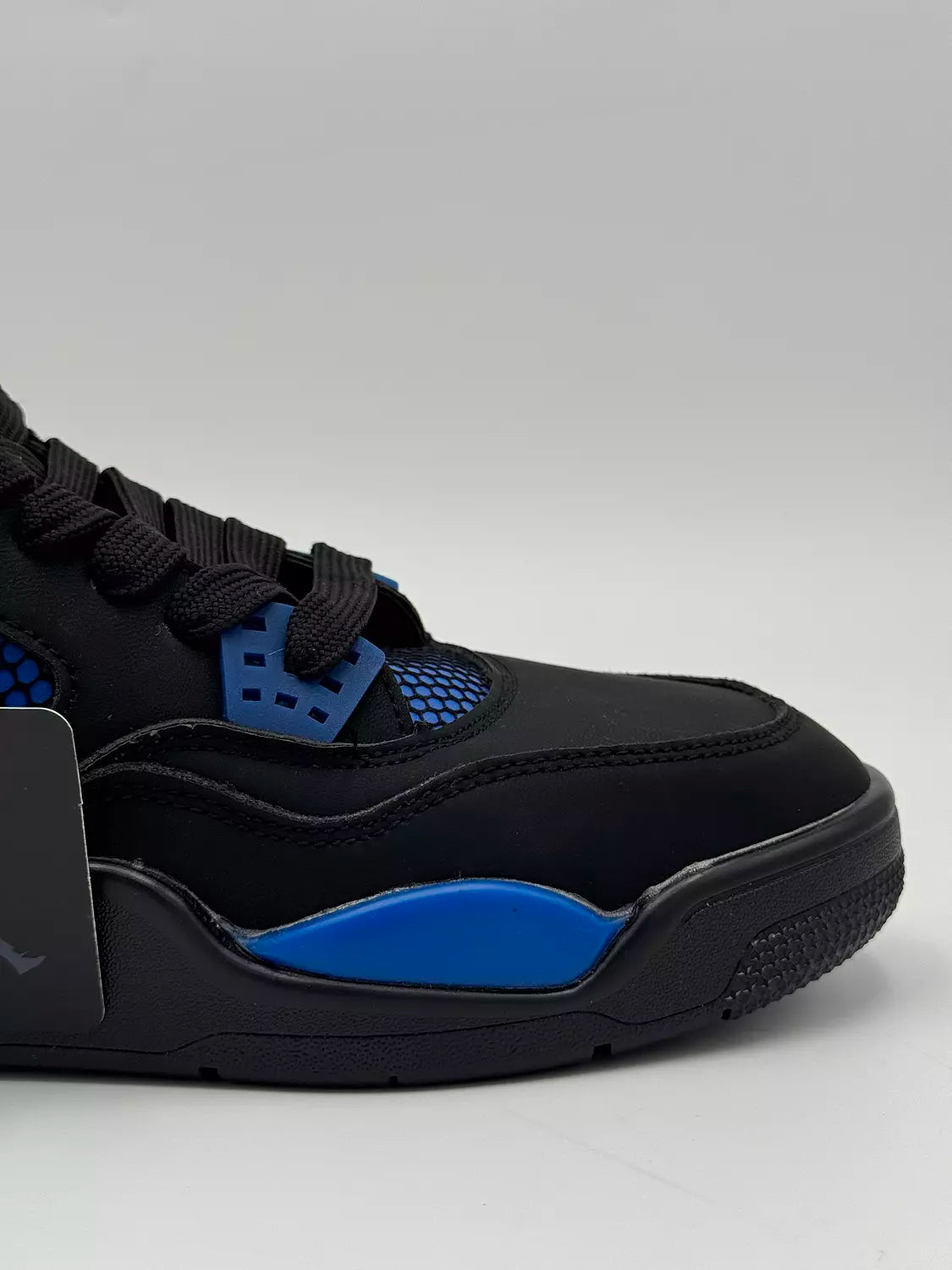 Nike Air Jordan 4 Retro "Black & Blue Thunder"