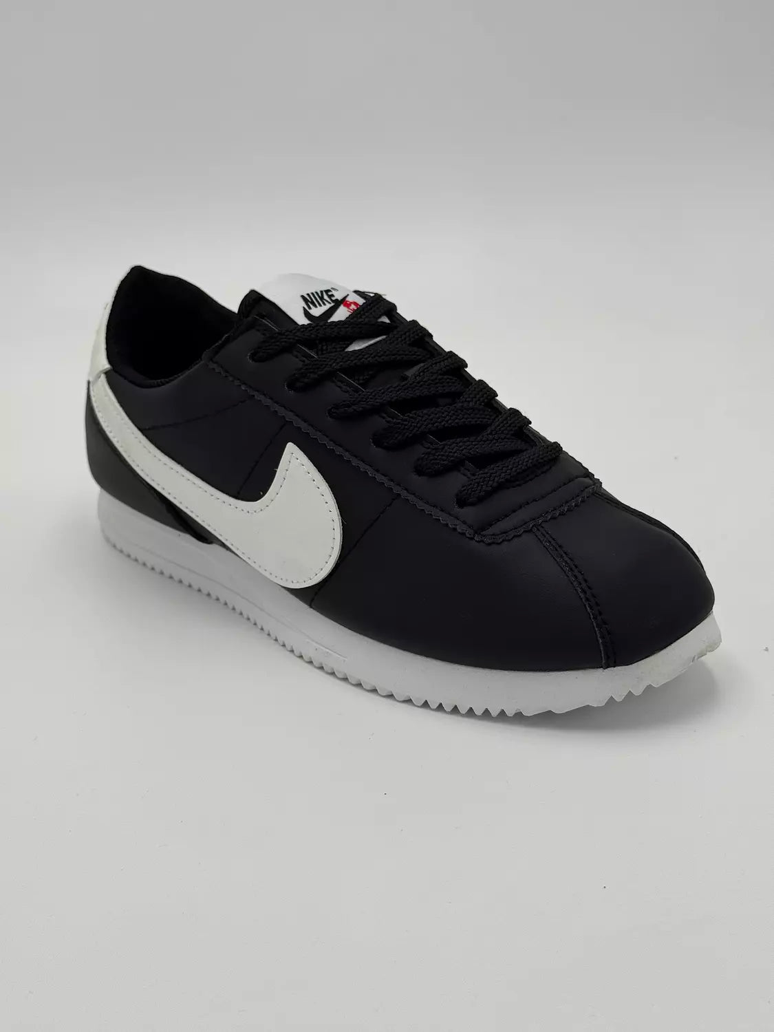 Nike Cortez "black & white swoosh"
