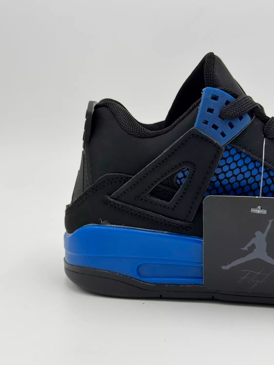 Nike Air Jordan 4 Retro "Black & Blue Thunder"
