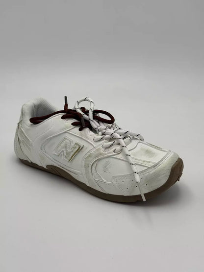 New Balance 530 SL Miu Miu "White X Gold Gum"